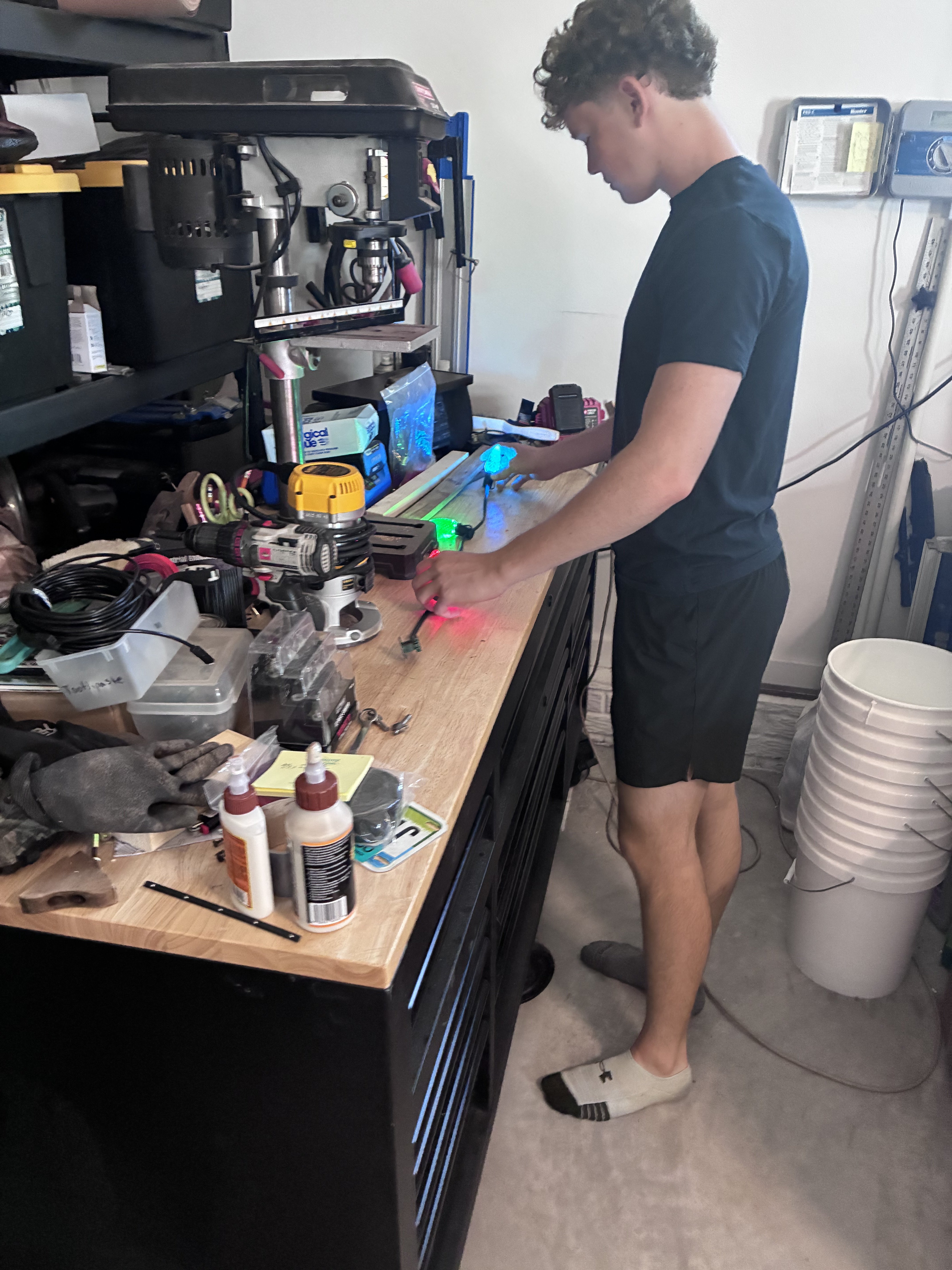 Owner on site checking clean roofline spacing with C9 bulbs