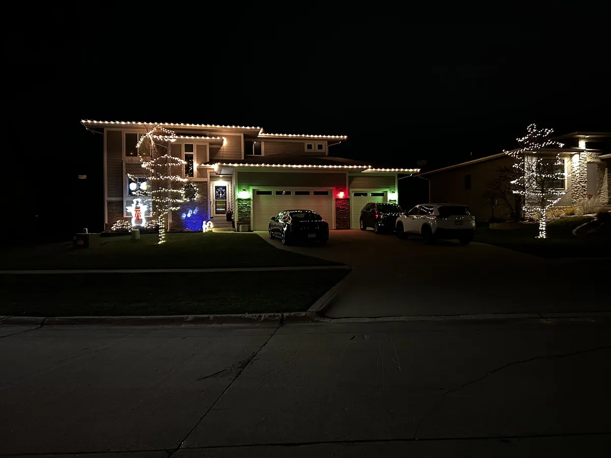 Full roofline Christmas light install on a two storey Waukee home