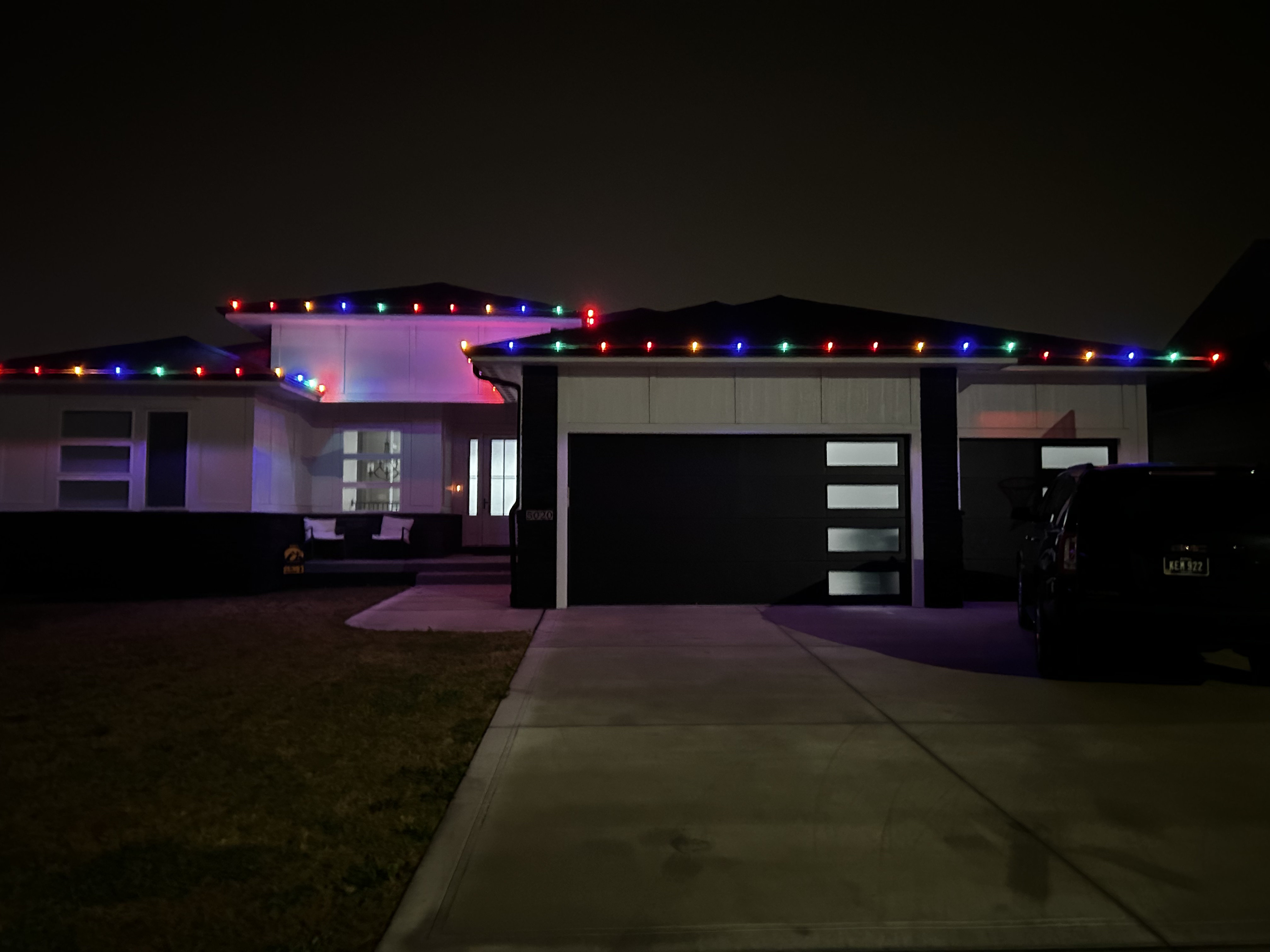 Modern home with permanent lights under the fascia channel